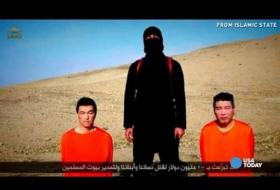 Japan vows not to give up on hostages held by ISIS